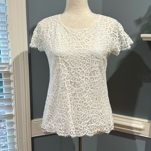 Lacey cut out scalloped fringe edge top